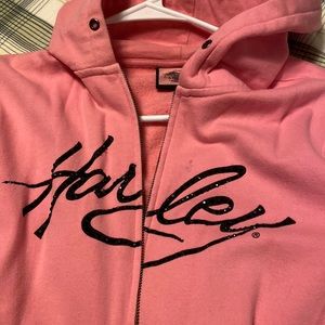This is a Harley Davidson pink zip up hoodie, size large